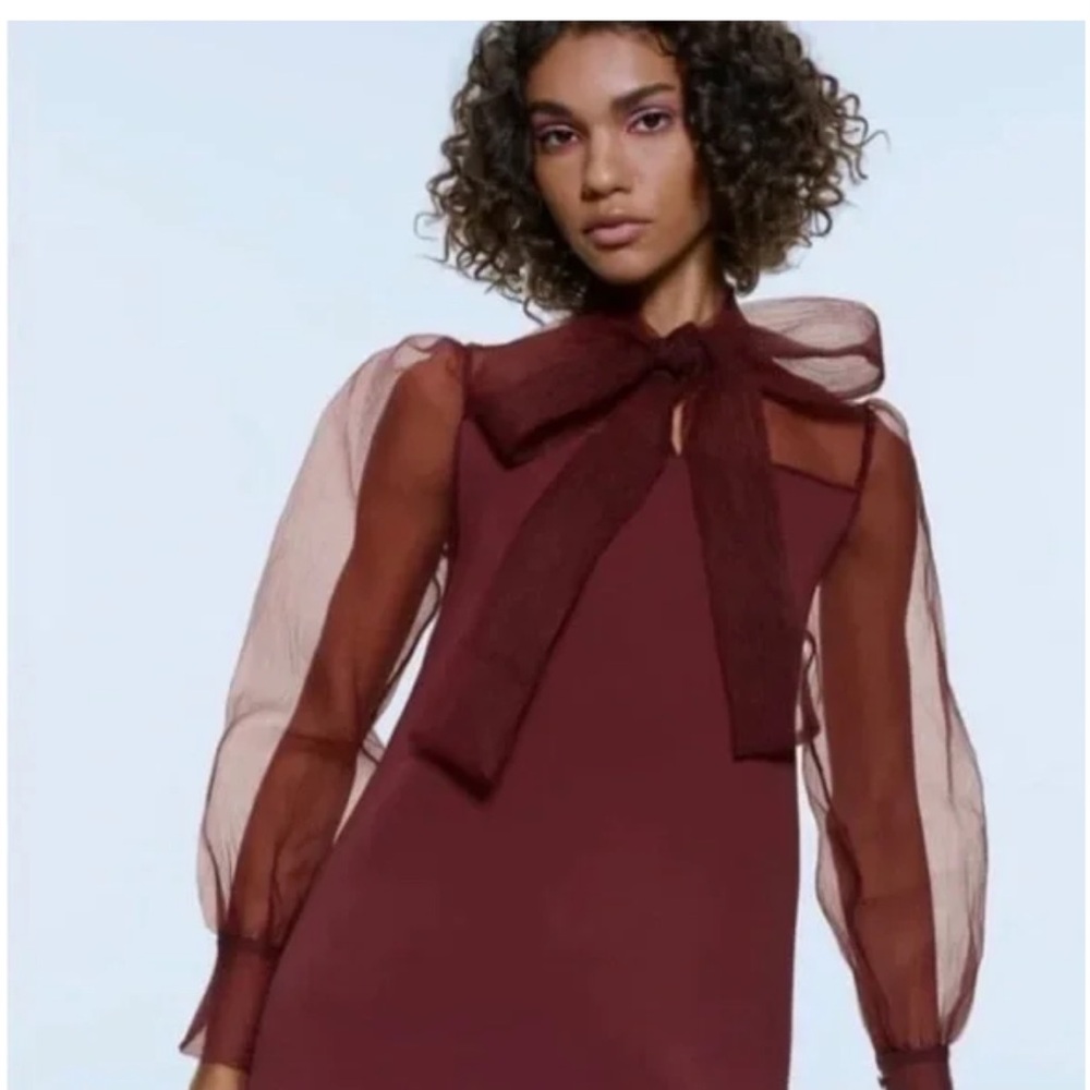 Burgundy dress.